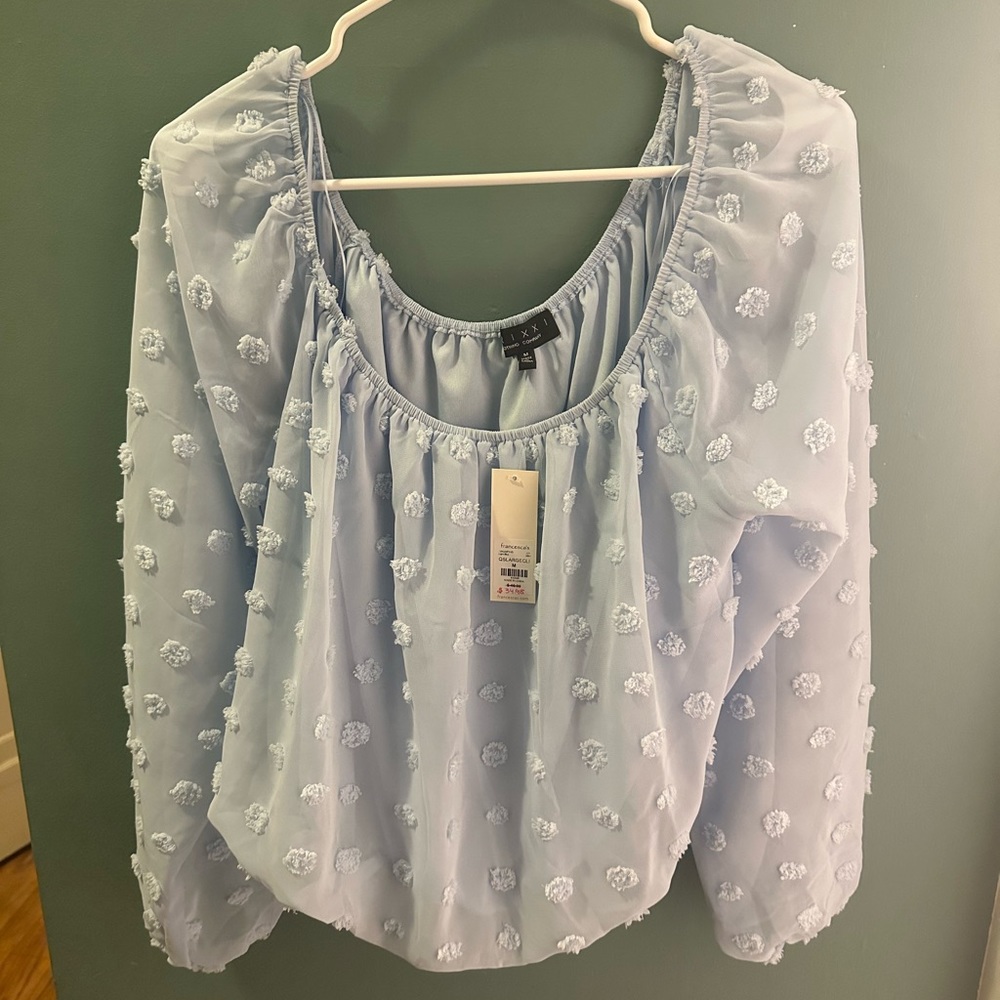 Francesca’s blue blouse